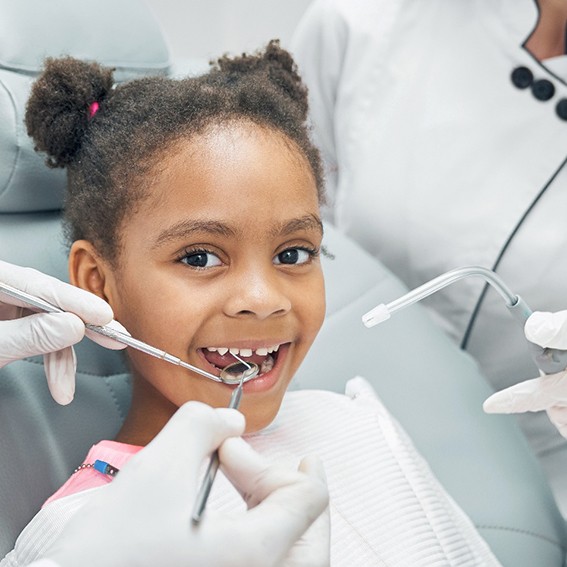 A little girl getting a dental crown