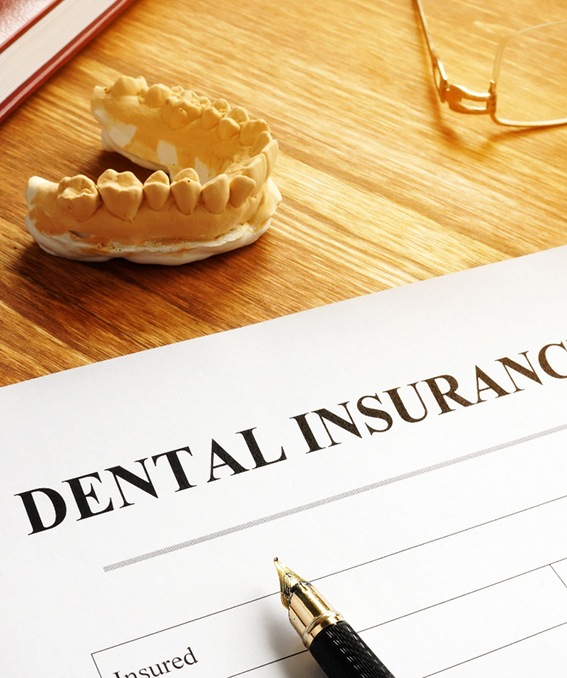 Dental insurance form on table 