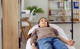 IV line on child’s arm in Marietta 