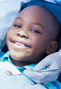 Boy smiling in the dental chair