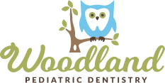 Woodland Pediatric Dentistry logo