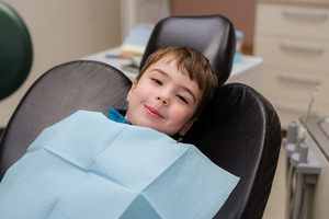 Little boy relaxing in dental chair