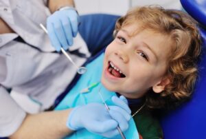 Child at the dentist getting a crown
